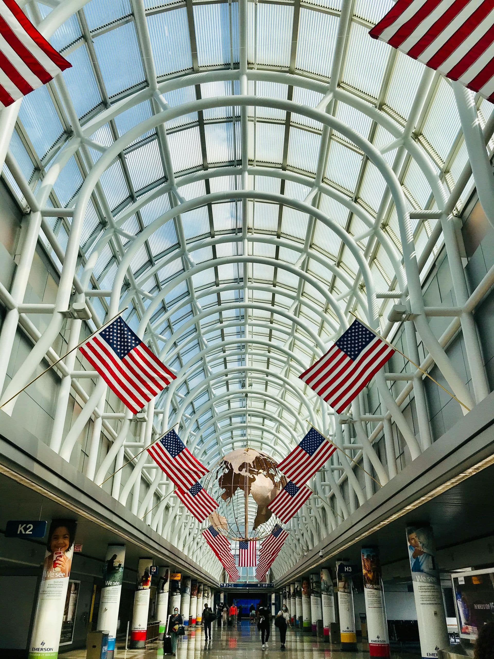 United States flags flying outside a public building